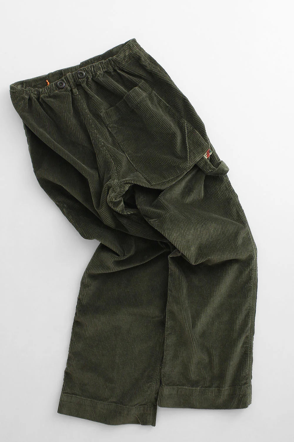 Olive green cashmere-blend French corduroy pants with an elastic waistband and back pocket by Bungalow.