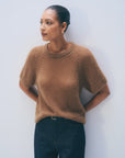 White + Warren mohair blend tee in white with dark jeans, styled in a minimal setting for Bungalow Furniture & Accessories.