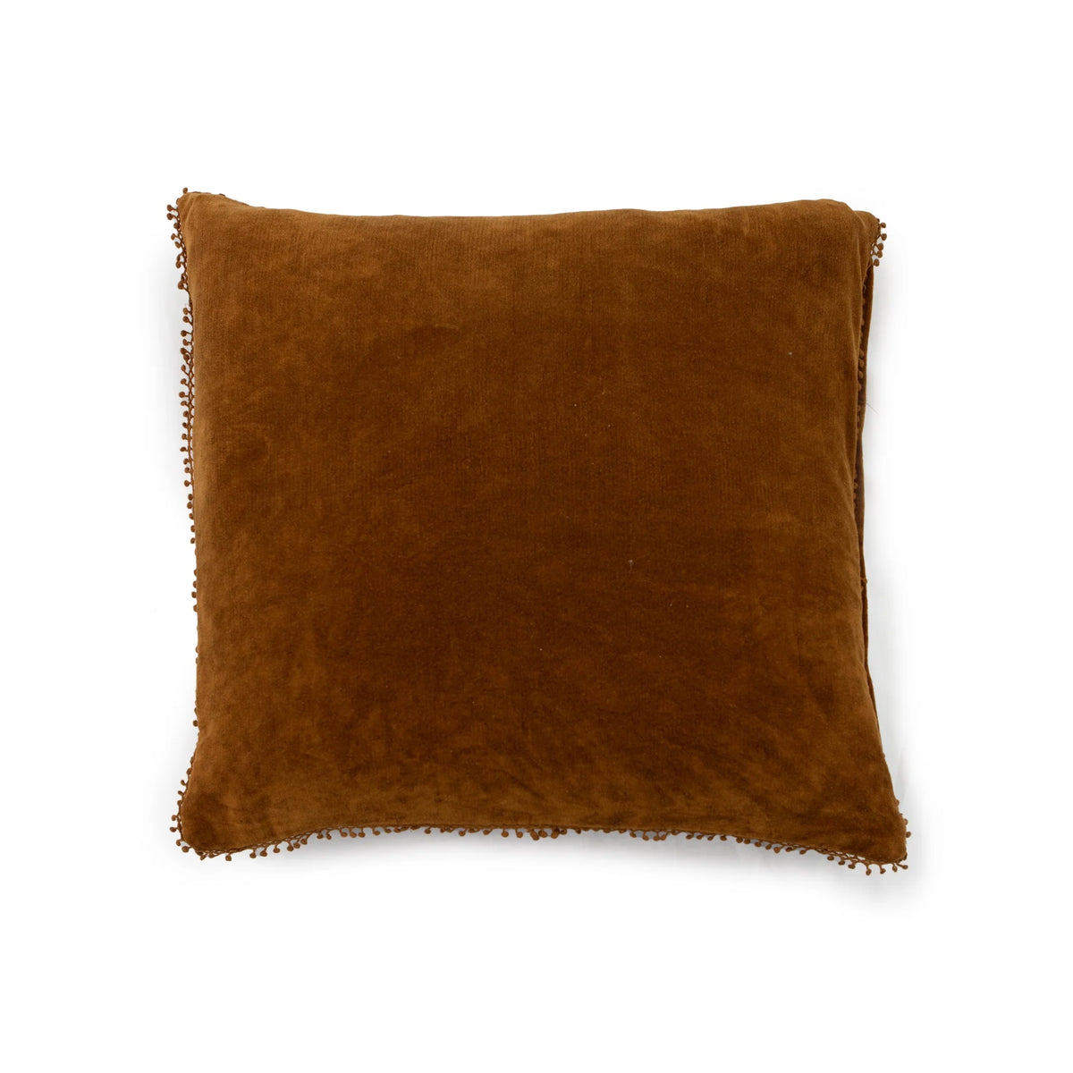 Velvet pillow in canyon with pom trim by Sugarboo Designs, displayed on a white background.