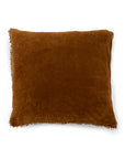Velvet pillow in canyon with pom trim by Sugarboo Designs, displayed on a white background.