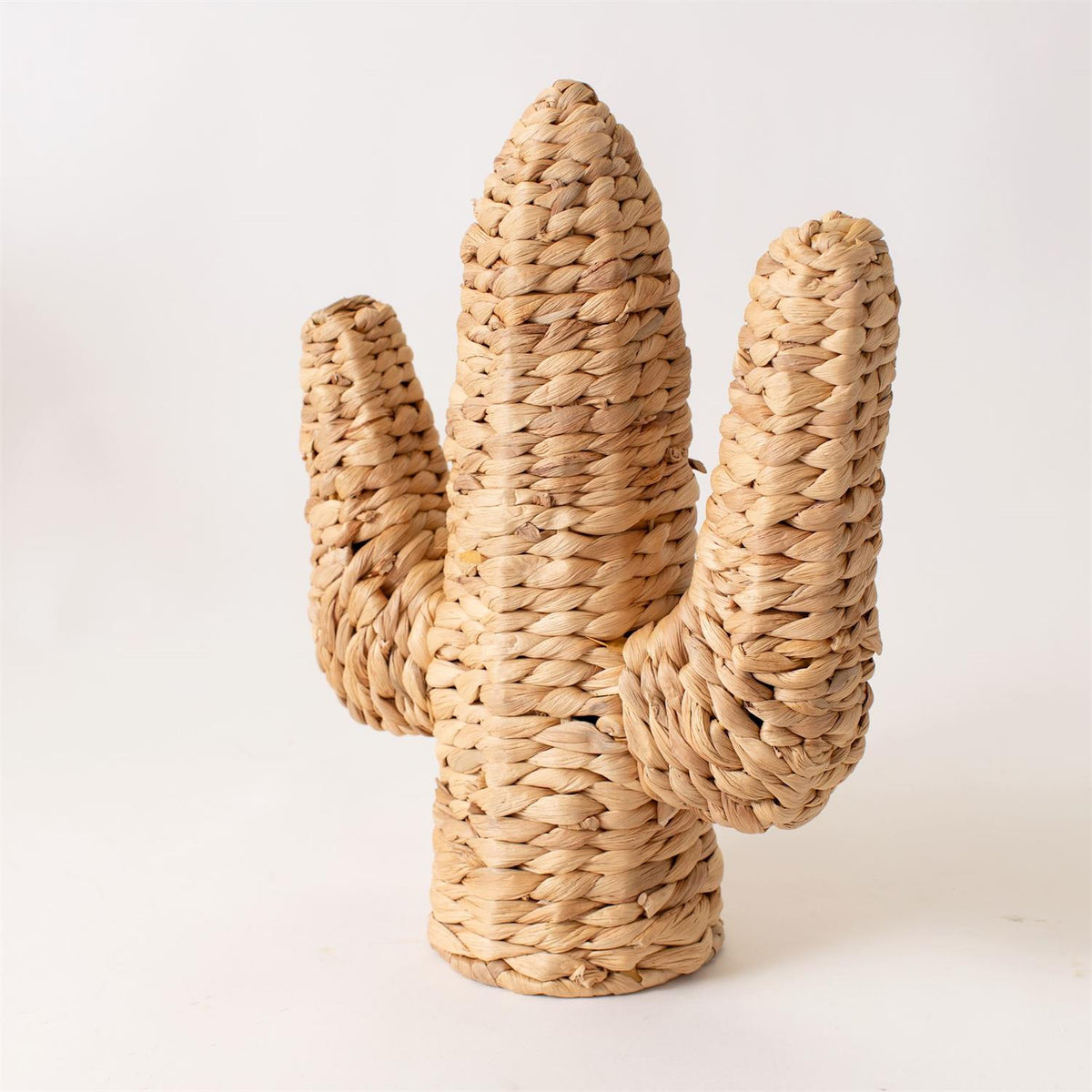 The Faire Cactus Figure Woven S is crafted from natural fibers, shaped like a three-armed cactus, and shown against a plain white background.