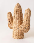 The Faire Cactus Figure Woven S is crafted from natural fibers, shaped like a three-armed cactus, and shown against a plain white background.