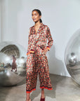 Hunter Bell NYC Whisper Pant and matching floral shirt in silk with orange trim.