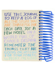 The Faire Gratitude Journal is a spiral-bound notebook made in the USA with a colorful cover that encourages daily notes of thankfulness: “Use this journal to keep track of what you’re thankful for, even when life feels chaotic.”.