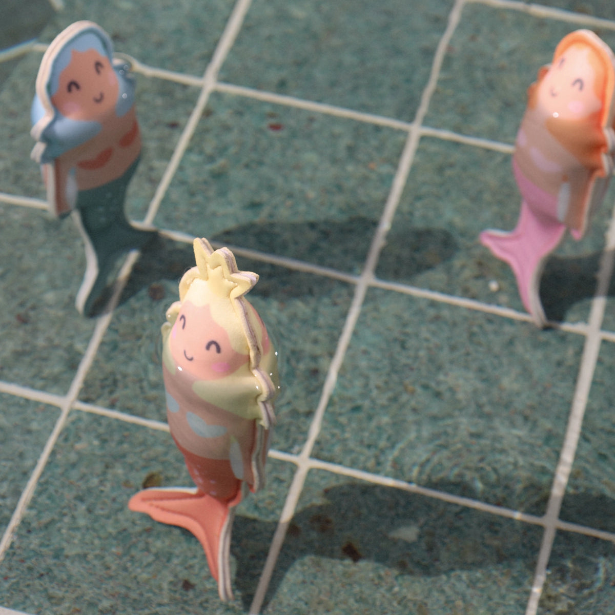 Faire’s Dive Buddies Melody the Mermaid Multi Set of 3 features colorful mermaid figures that stand upright on pool tiles, perfect for water play and encouraging children’s diving skills in the sun.