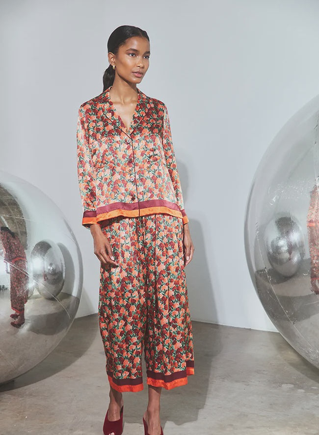 Floral silk long-sleeved button-down shirt and matching Whisper Pant on model.