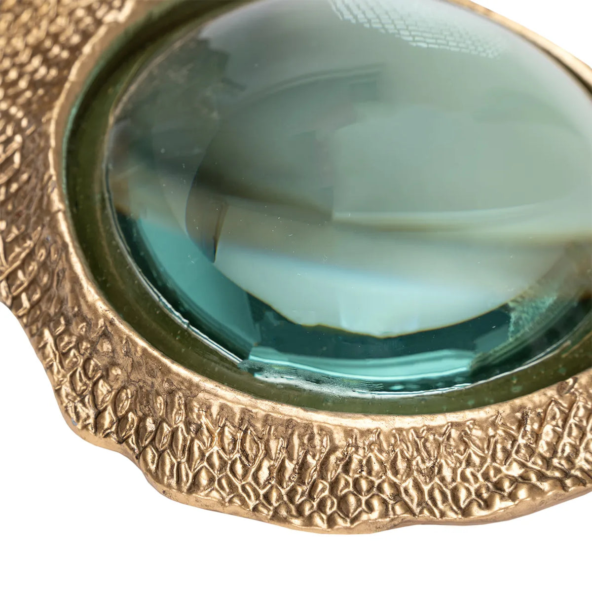 Kasden magnifying glass with a textured gold-toned frame, an elegant desk accessory from Bungalow Furniture &amp; Accessories.