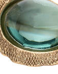 Kasden magnifying glass with a textured gold-toned frame, an elegant desk accessory from Bungalow Furniture & Accessories.