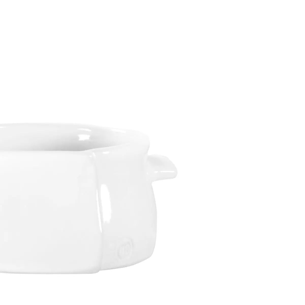 The Montes Doggett S Baker No. 137 is a white, microwave-safe ceramic soup bowl with a small handle on the right, partially shown on the left side against a plain white background.