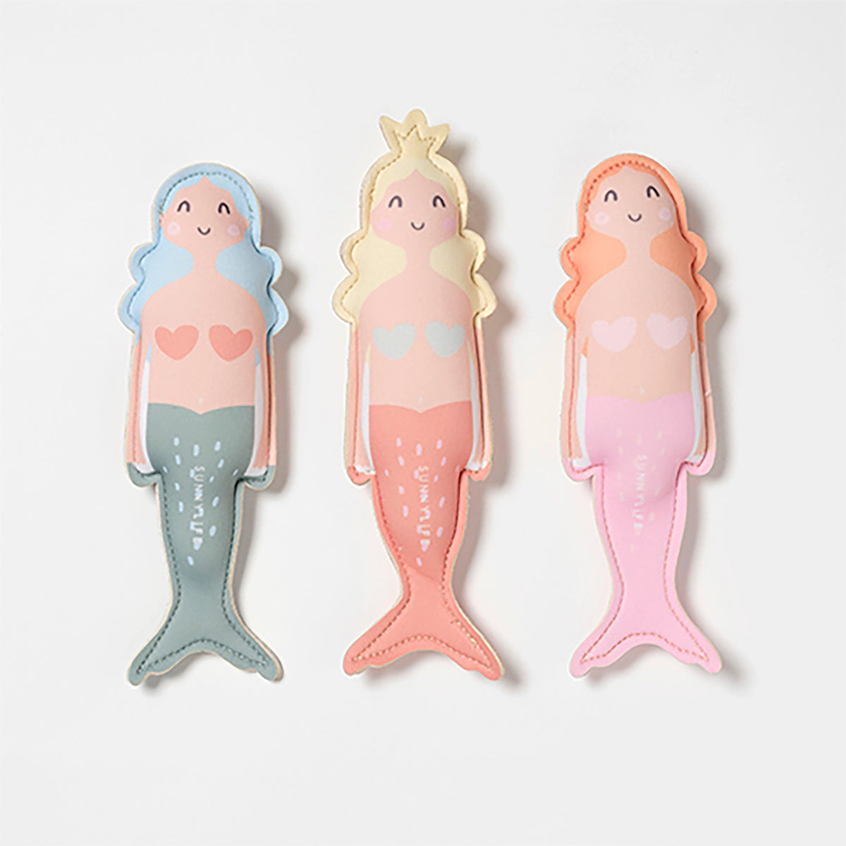 The Faire Dive Buddies Melody the Mermaid Multi Set of 3 features plush mermaid dolls in pastel blue/green, yellow/peach, and orange/pink with heart details—fun companions for water or pool play.