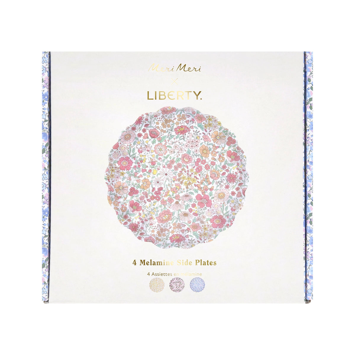 Set of four small floral melamine side plates by Faire Meri Meri x Liberty in a reusable box.