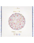 Set of four small floral melamine side plates by Faire Meri Meri x Liberty in a reusable box.