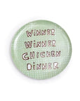 The Breakfast Club Plate Set by Sugarboo Designs features a green plate with a dotted pattern and "Breakfast Of Champions Winner Winner Chicken Dinner" in brown, playful letters at the center.