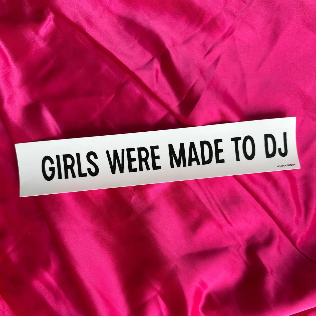 Glossy rectangular GIRLS WERE MADE TO DJ sticker in hot pink with black text from Bungalow Furniture &amp; Accessories.