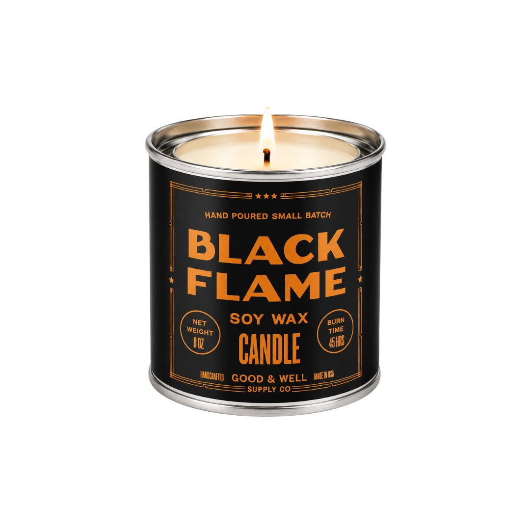 Black Flame soy candle by Faire with orange and black design, limited edition, incense oud leather scent.