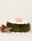The Salmon Sushi Warmies by Faire is a microwavable plush toy shaped like a sushi roll with a white and green body, orange salmon top, and brown fin flaps, designed to offer sensory comfort.