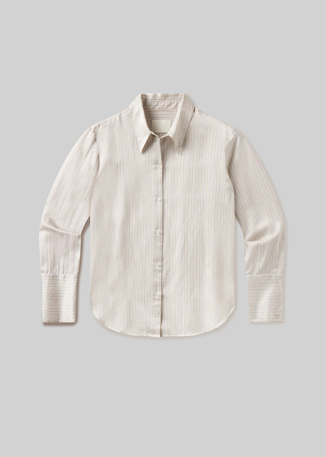 The camilia shirt S26 by Citizens Of Humanity/AGOLDE features long sleeves, a button-up front, a pointed collar, and subtle vertical stripes in light beige tones, all displayed on a plain gray background.