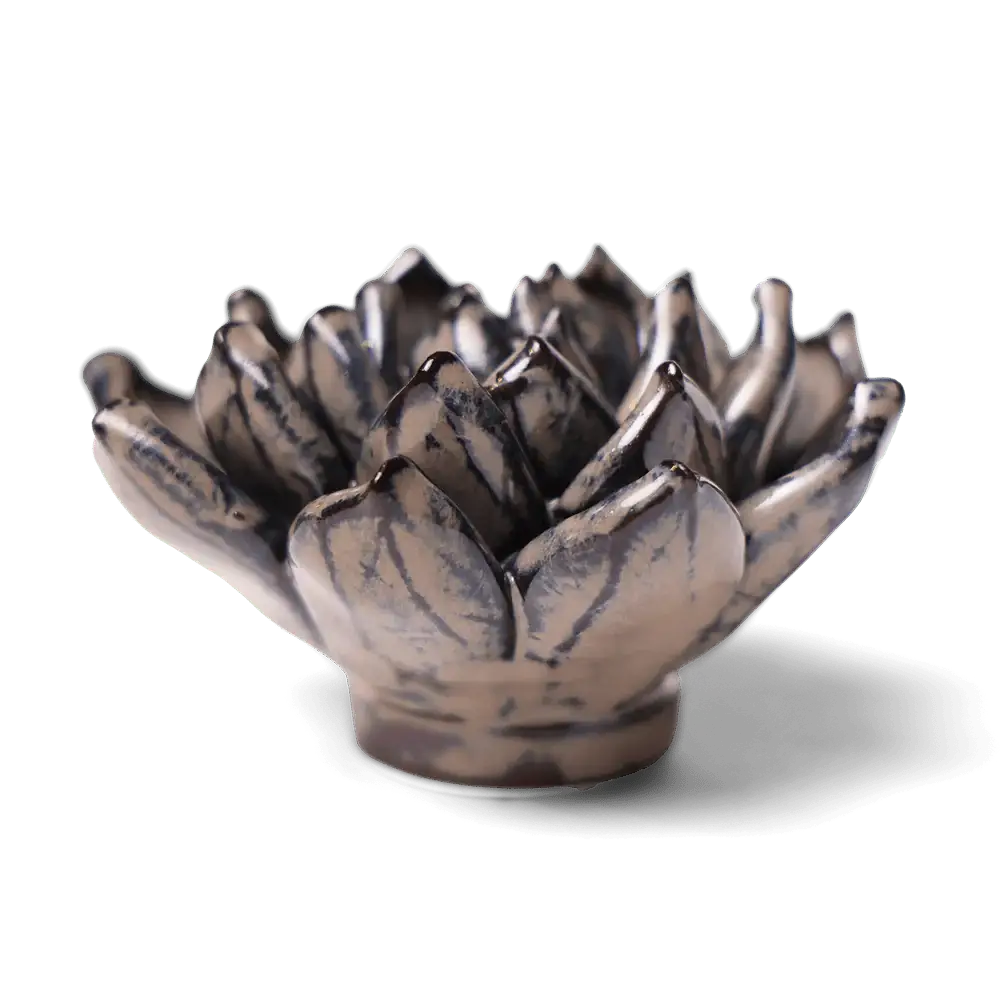 Hand-sculpted ceramic lotus flower figurine in brown and cream from the Bungalow Furniture &amp; Accessories Boho collection.