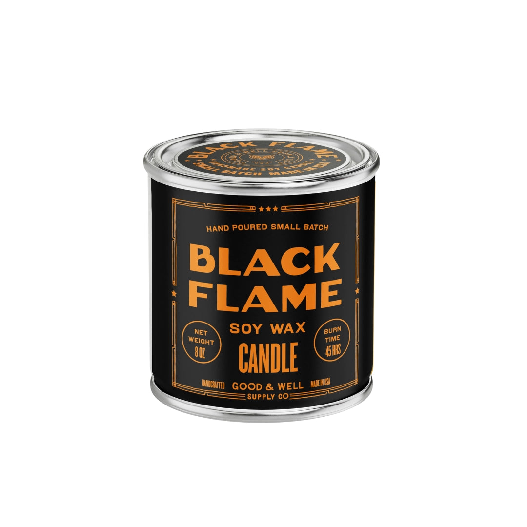 Black tin candle with orange text, Faire Black Flame Soy Candle, 8 oz, perfect for modern home decor.