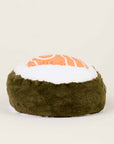The Faire Salmon Sushi Warmies is a microwavable plush toy shaped like a salmon sushi roll, offering gentle warmth and cozy comfort. It features a white top, orange salmon pattern, and dark green seaweed base.