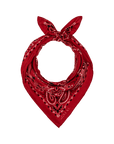 The Silk Bandana by The Great Inc. is a red silk accessory featuring a white and black paisley pattern, folded and knotted at the top for a timeless, vintage-inspired look.