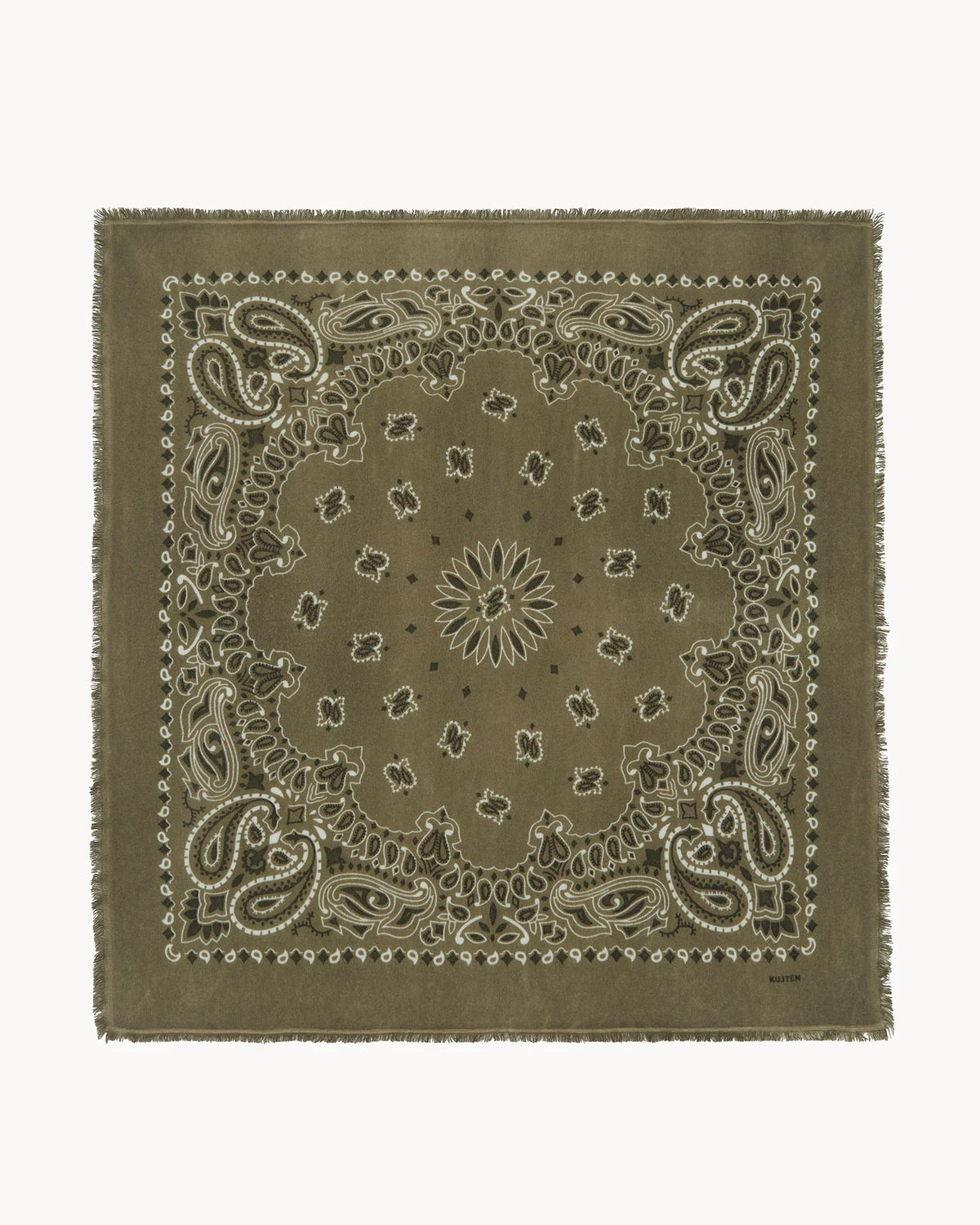 The KUJTEN Hachiko Scarf is a square olive green accessory with a white paisley and floral print, finished with frayed edges.