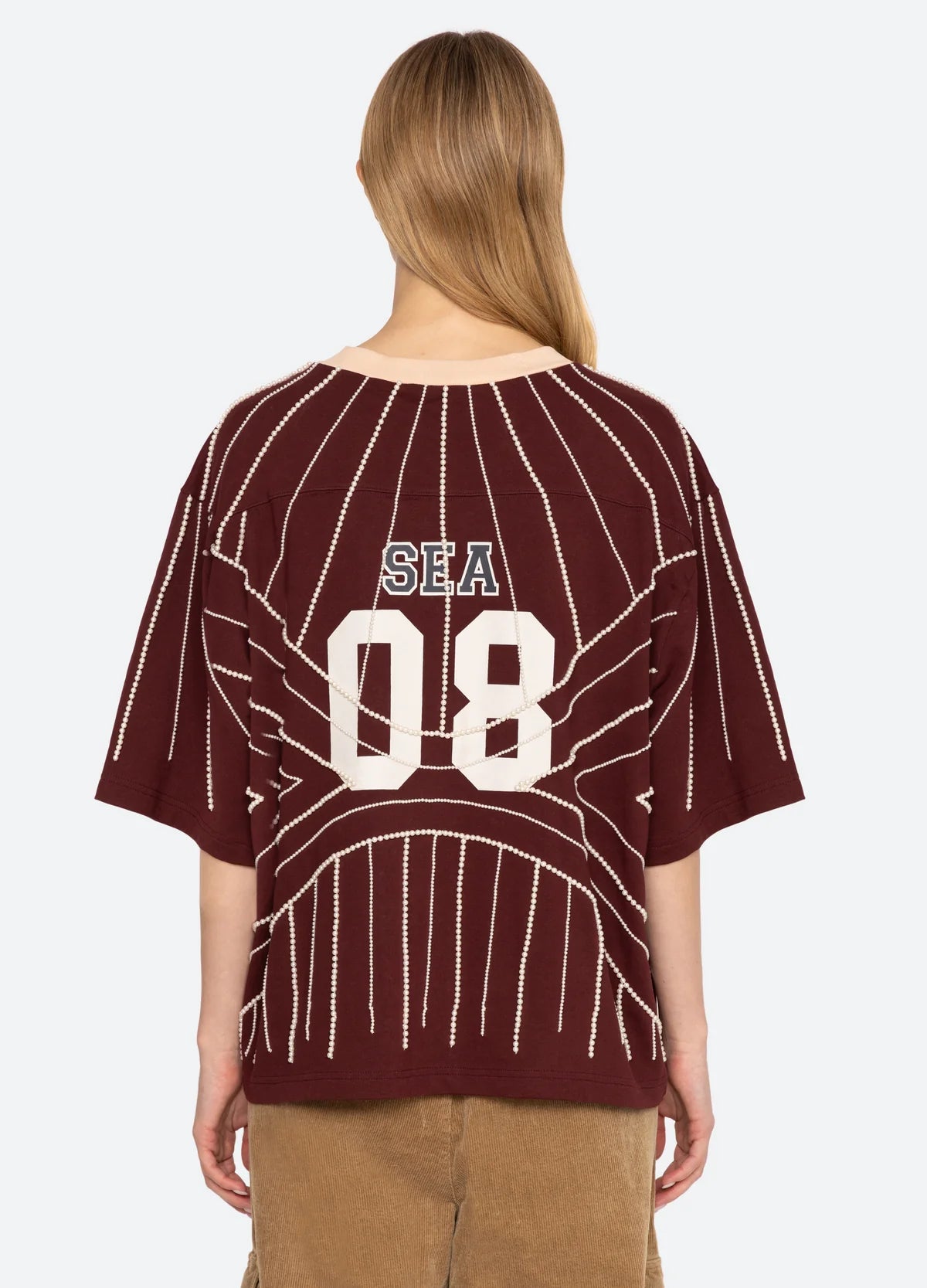 Maroon short-sleeve varsity T-shirt with white pearl beading and SEA 08 on the back, Quinn Emb Beaded T-shirt.
