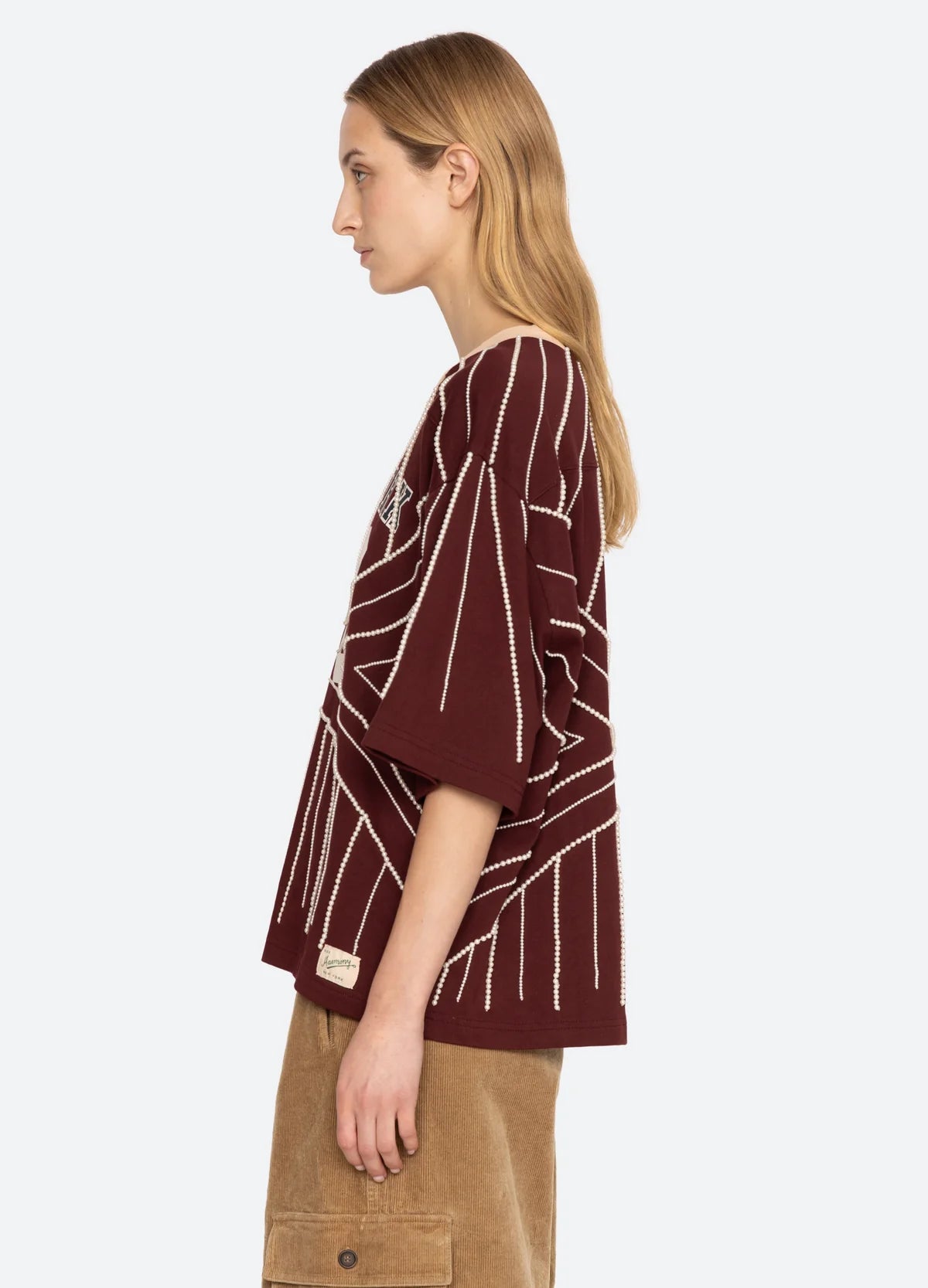 Maroon Sea New York Quinn beaded T-shirt with geometric white pearl detailing and a relaxed dropped shoulder fit.