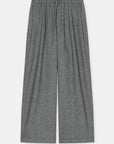 Gray relaxed fit wide leg trousers with elastic waistband and drawstring by CLOSED, displayed on white background.