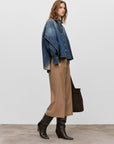 CLOSED Wren Pant styled with a loose denim jacket and black boots, modern casual look against neutral backdrop.