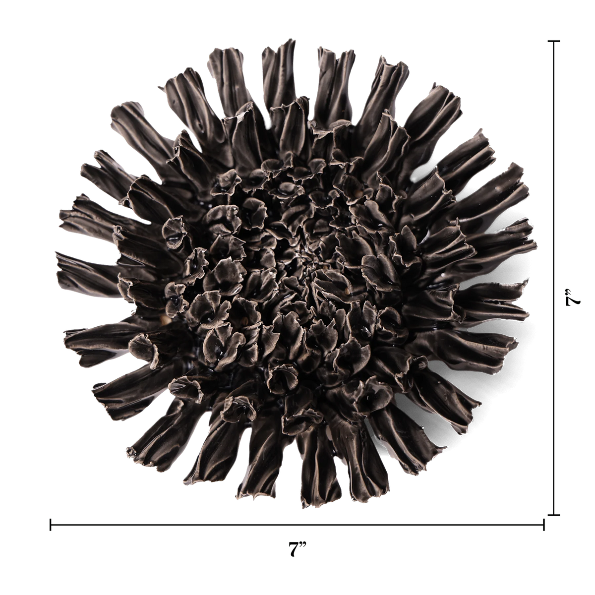 The Faire Fractal Black Flower is a round, dark brown pottery piece with ruffled, textured edges, measuring 7"x7". Shown against a white background with measurement lines, it features a handmade flower-like design.