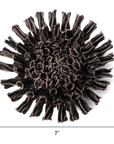 The Faire Fractal Black Flower is a round, dark brown pottery piece with ruffled, textured edges, measuring 7"x7". Shown against a white background with measurement lines, it features a handmade flower-like design.