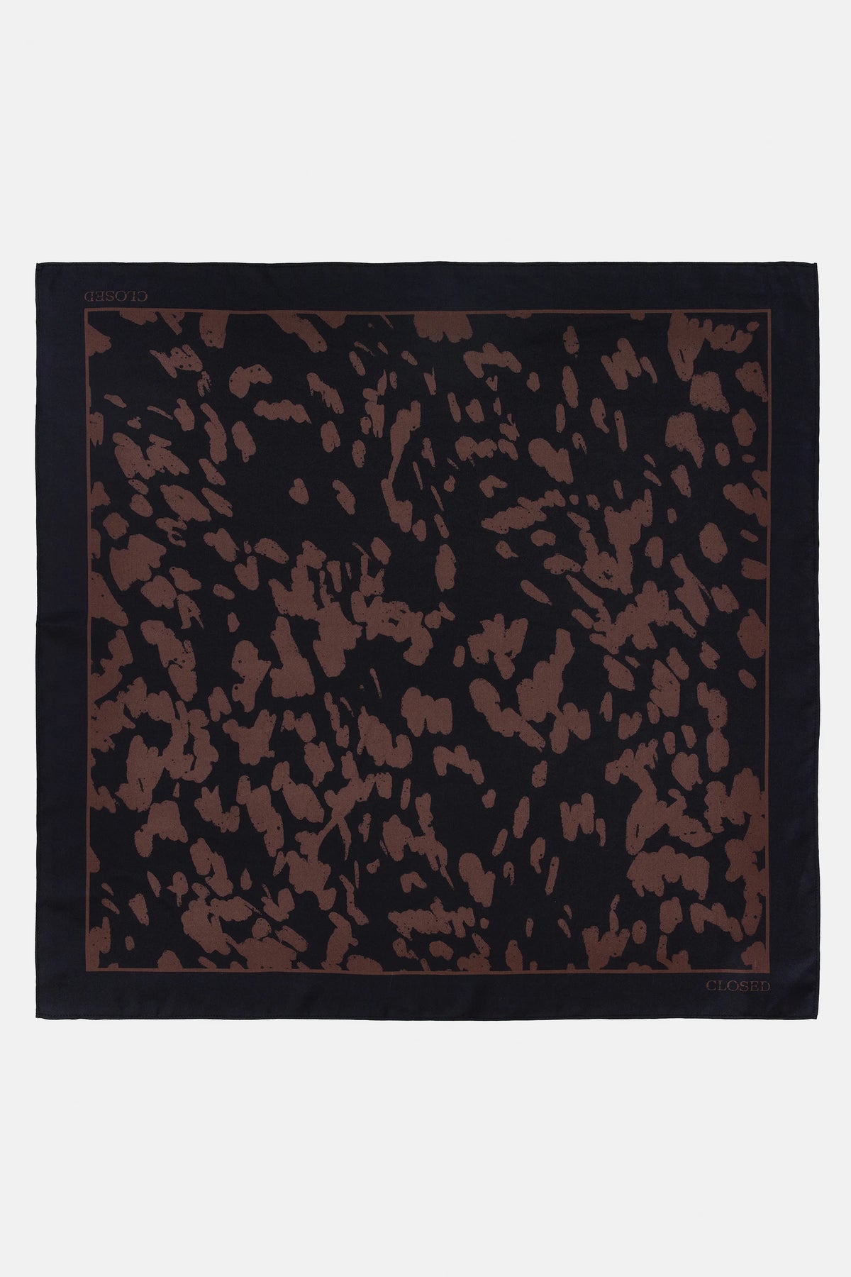 Black silk scarf with abstract brown animal print and thin border, by CLOSED, displayed on white background.