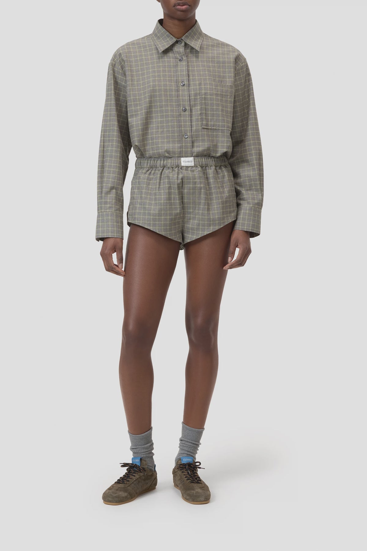 CLOSED Boxer Pantie styled with casual plaid shirt and high-waisted shorts, relaxed modern look.