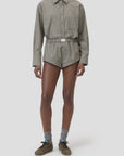 CLOSED Boxer Pantie styled with casual plaid shirt and high-waisted shorts, relaxed modern look.