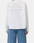 CLOSED embroidered shirt in white with blue wide-leg jeans, back view, modern casual style.