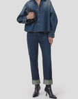 CLOSED Overlay Detail Shirt with jeans and black boots, styled for a modern look against a simple backdrop.