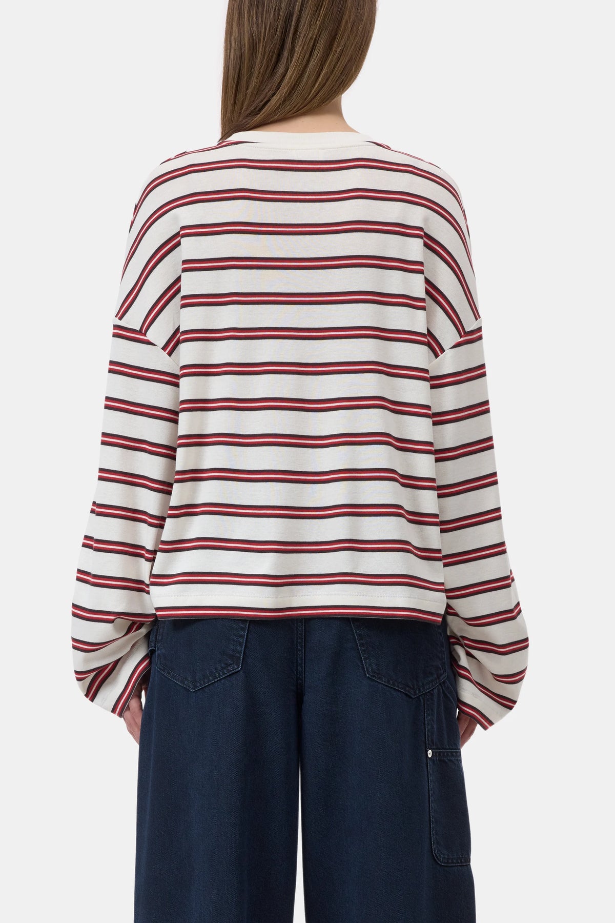 CLOSED multicolour striped crewneck long sleeve top and dark wide-leg jeans, viewed from the back.