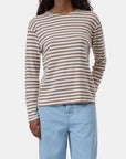 CLOSED brown and white striped long sleeve tee with light blue jeans, casual modern look.