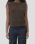 Brown CLOSED crew neck vest styled with high-rise dark jeans with metallic grommet accents from Bungalow Furniture.