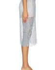 Light blue lace PENCIL Skirt with elastic waistband, worn with matching strappy heels, Bungalow Furniture & Accessories.