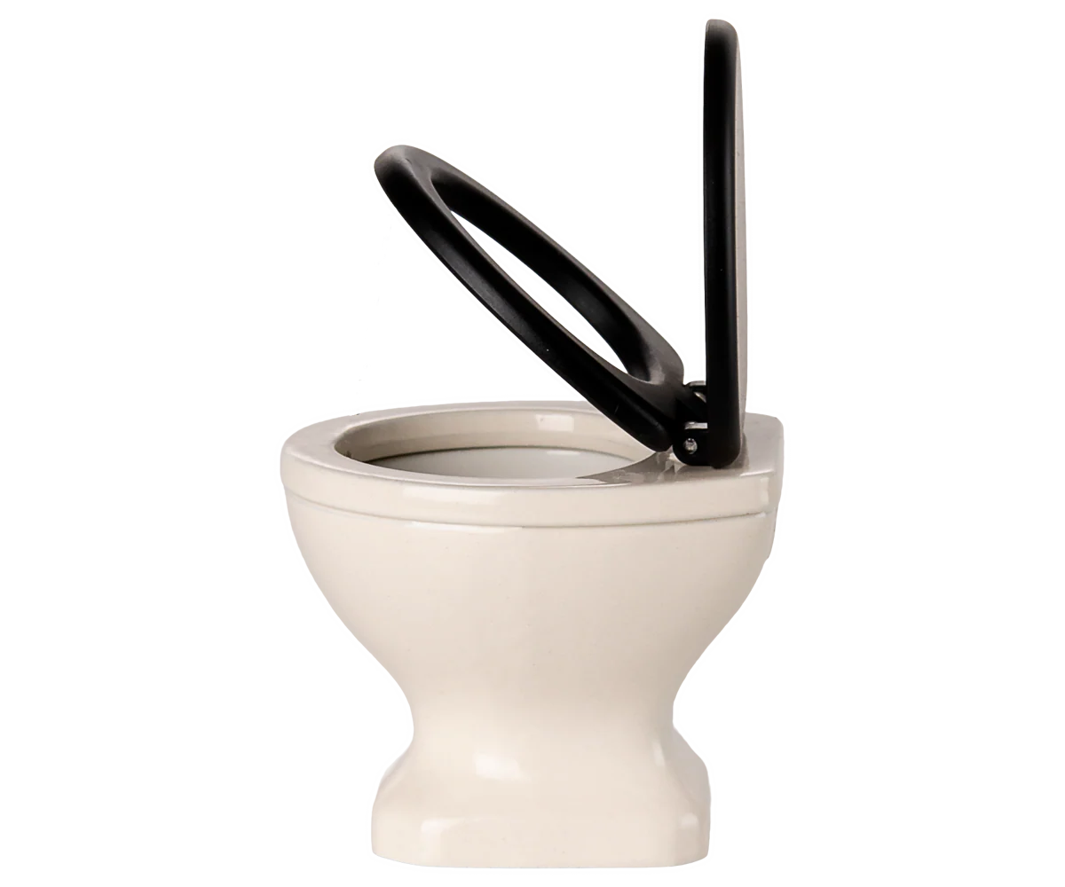 Maileg off white mouse WC with black seat and raised lid, side view; Maileg kids toy furniture.