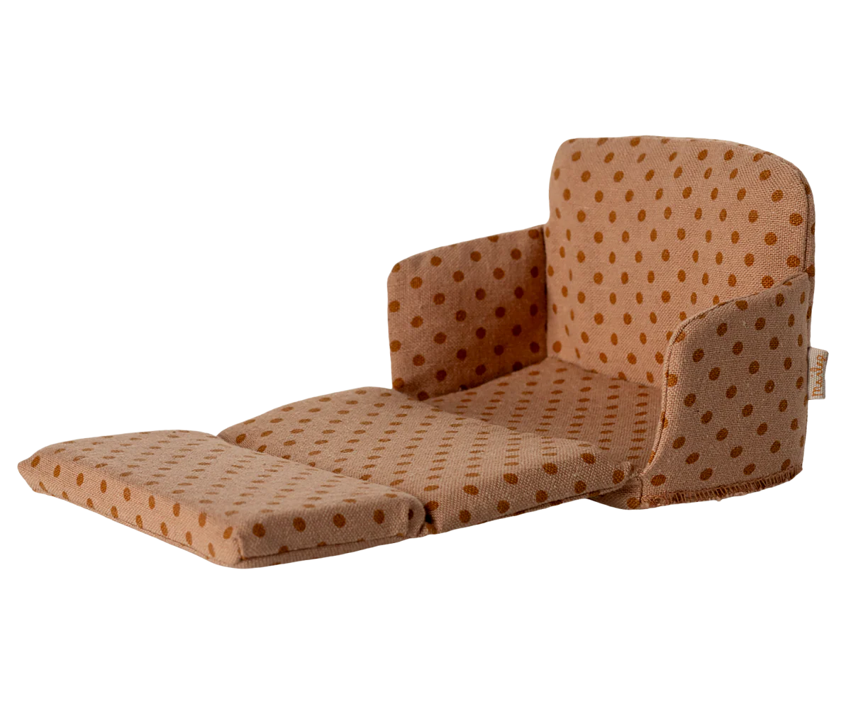 The Maileg Sofa Bed by Maileg is a miniature sofa with light brown fabric, orange polka dots, backrest, armrests, and an extended footrest—ideal as a mouse sofa or for a SuitCasa living room.