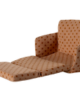 The Maileg Sofa Bed by Maileg is a miniature sofa with light brown fabric, orange polka dots, backrest, armrests, and an extended footrest—ideal as a mouse sofa or for a SuitCasa living room.