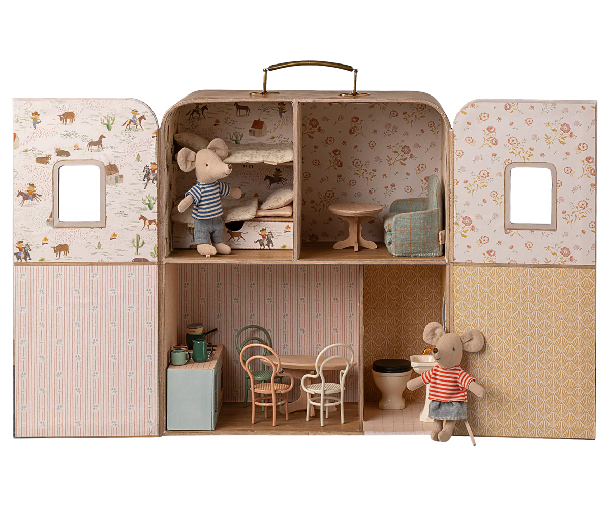 The Maileg SuitCasa Little Sis & Bro by Maileg is a portable mouse house with patterned walls, furnished rooms, two striped-shirt mice, kitchen, dining area, bathroom, bunk bed bedroom, living room, and handcrafted toy accessories.