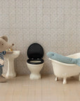 Maileg Mouse WC in off-white shown in a whimsical bathroom scene, by Maileg for Bungalow Furniture & Accessories.
