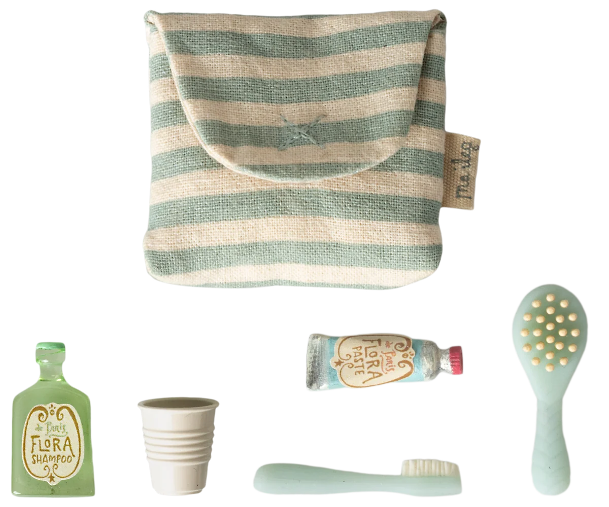 Blue striped pouch with toy toothbrush, toothpaste, and cup by Maileg—perfect for a mouse bathroom set.