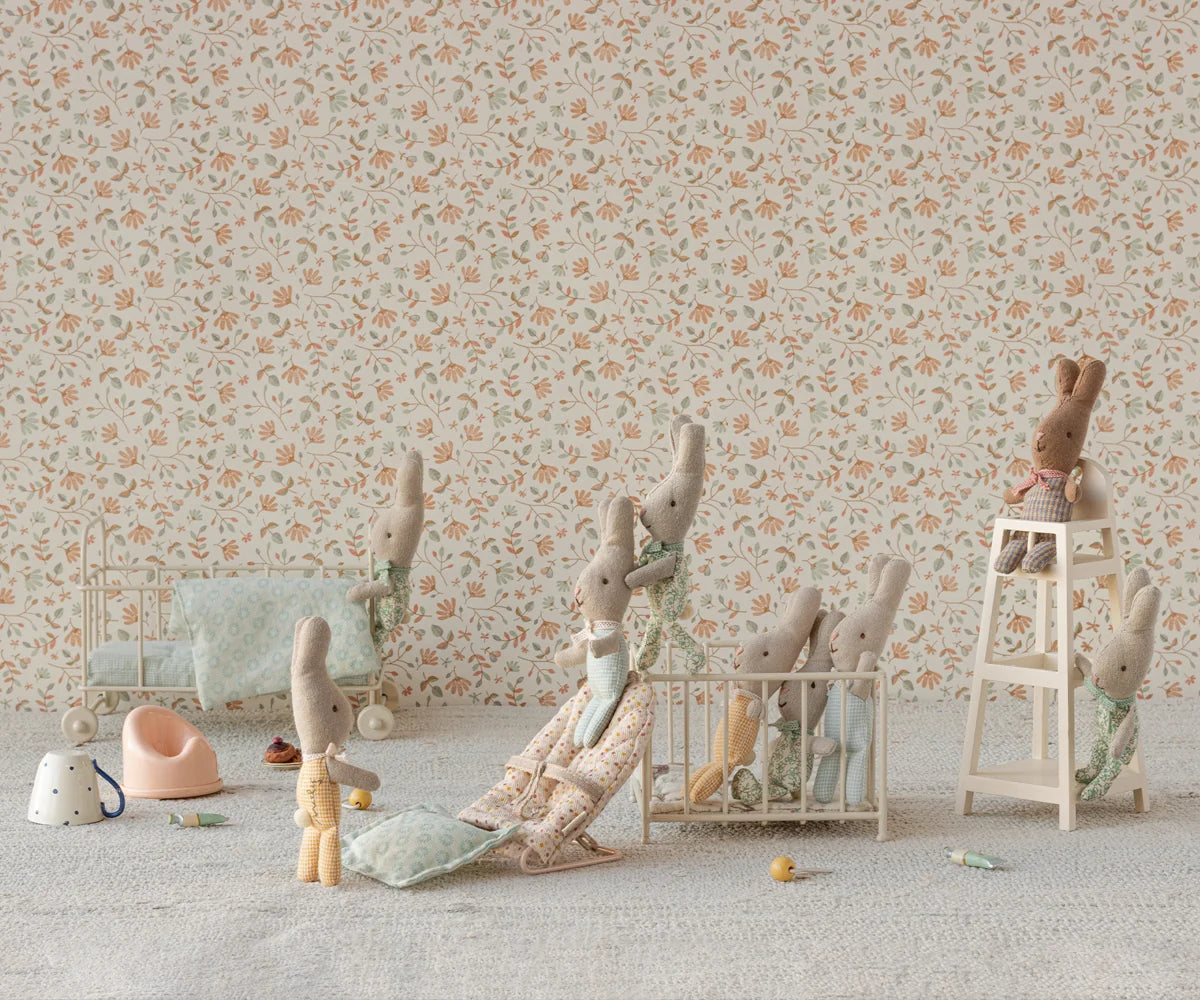 Maileg Micro Potties in a playful nursery scene with cribs and toys, styled for a whimsical children’s room.