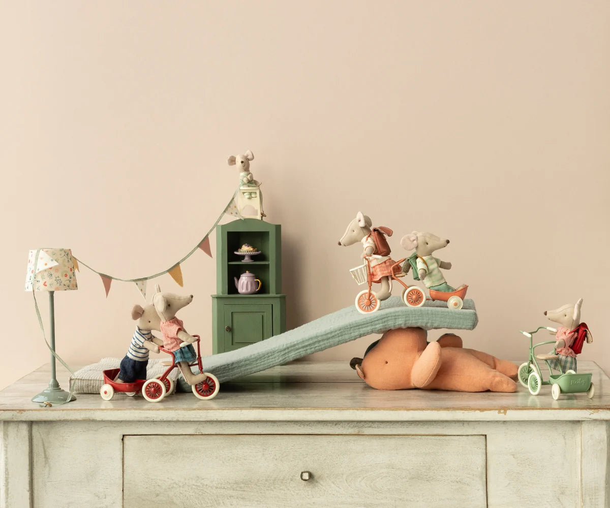 Maileg toy mice on teddy bear with Corner Cabinet, styled in pastel Mouse Hole Farmhouse by Bungalow Furniture & Accessories.