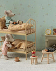 Maileg Bunk Bed with two toy mice in pajamas, pillows, and bedding.